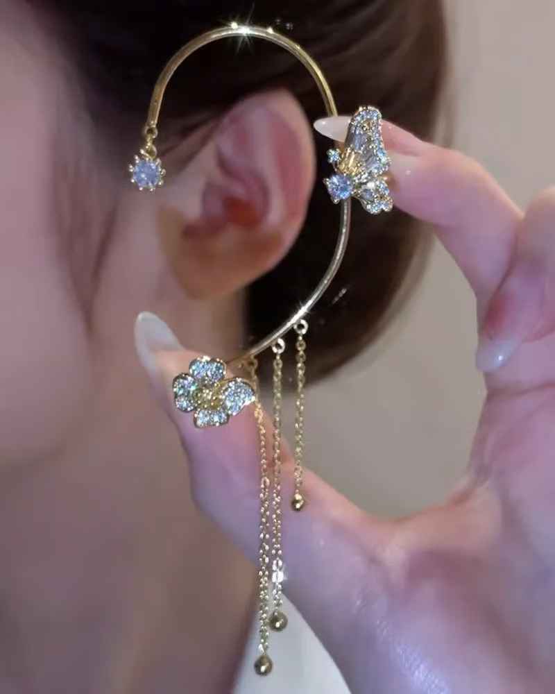 Boucles d'oreilles pendantes papillon à pompon et zircon